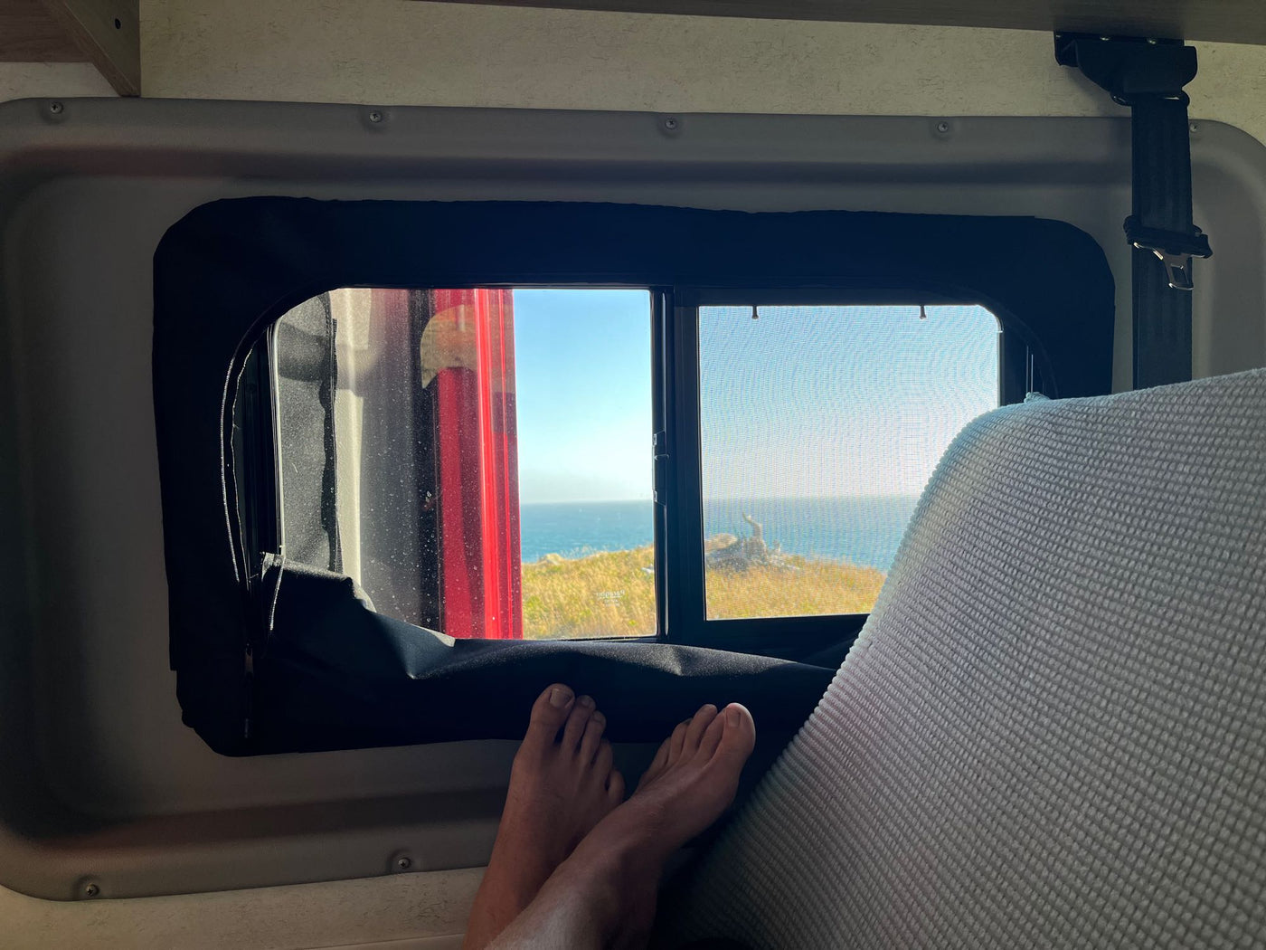  and useful shelving holding Dr. Bronner's soap. Ideal for trips.|Inside your rv rental: a Pioneer touchscreen shows the backup camera view — photo 16