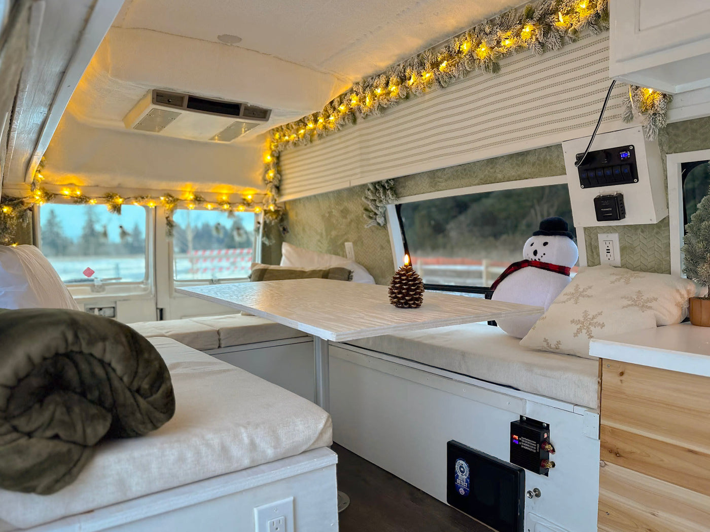  and a "welcome" sign.|Step inside this charming RV rental — photo 5