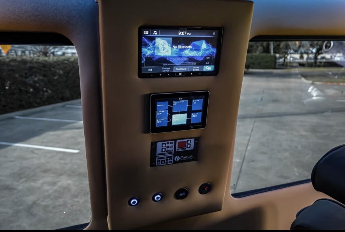  and digital control panel.|Premium black leather — photo 8