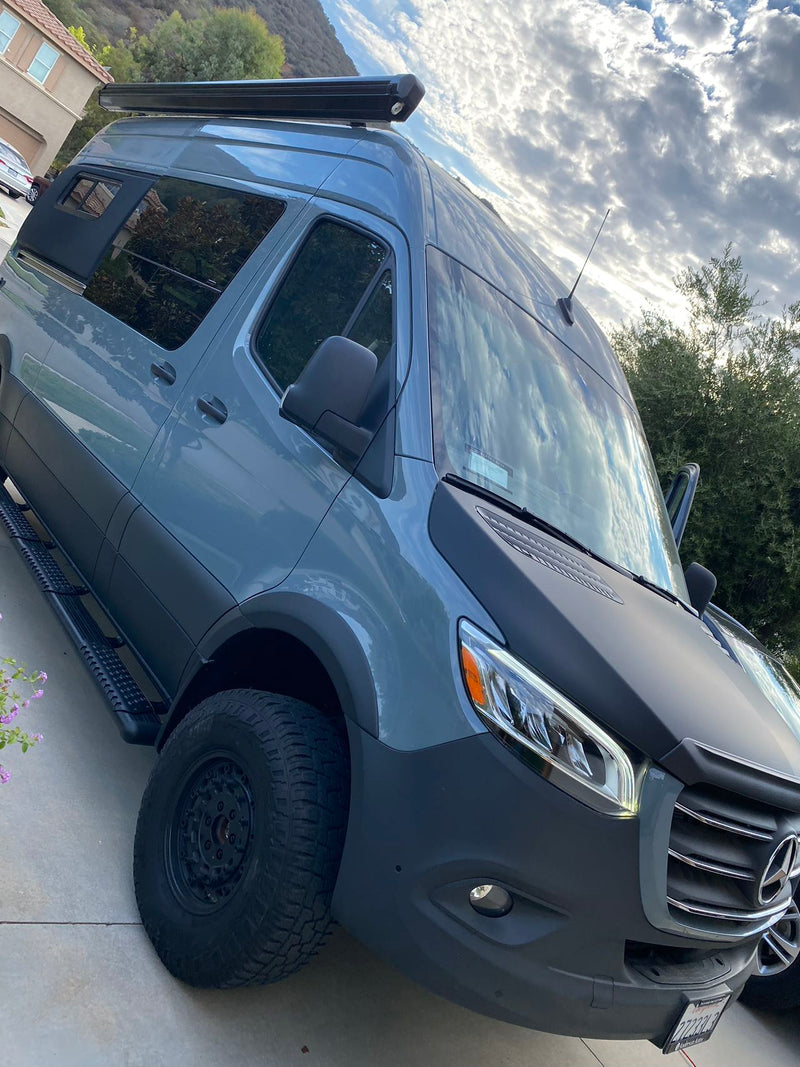  and smart storage for travel.|Customized grey Mercedes Sprinter adventure van — photo 3