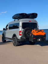  ideal for adventure.|Silver pop-top camper van with front cargo rack and overland setup