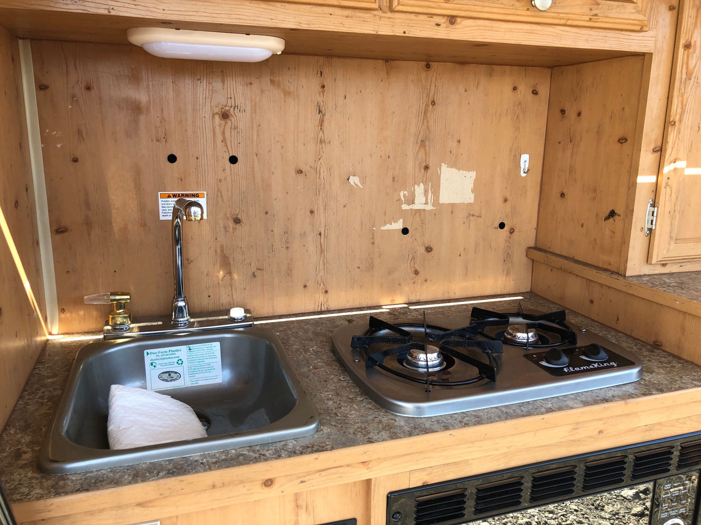  camouflaged teardrop camper for RV rental — photo 10