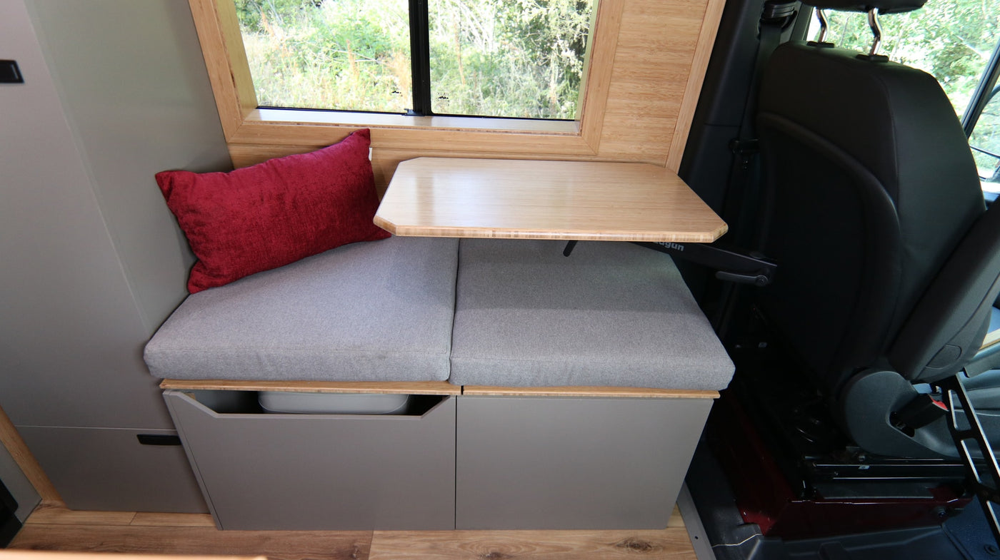  and a cozy dinette.|Explore this modern camper van rv rental interior: wood-paneled walls — photo 8