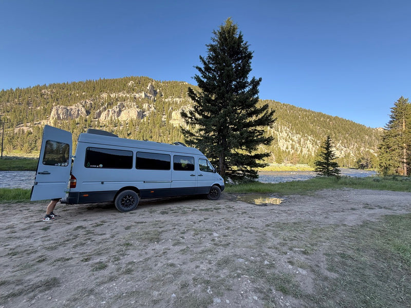 and bright curtains.|Looking into the back of this RV rental van — photo 5