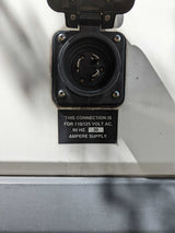 RV rental 30-amp, 110/125V AC shore power inlet. Essential for RV electrical connection, charging, and appliances.