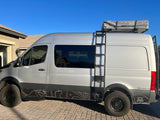 Custom silver rv rental camper van with rooftop tent, side & rear ladders, and topo wrap.