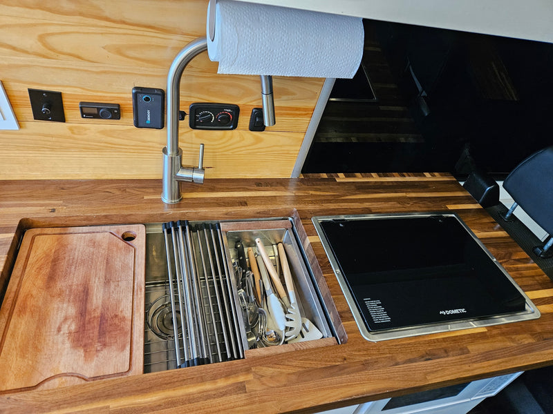  open to a garage view.|Spacious camper van interior — photo 8