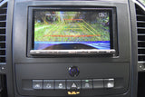 RV rental dashboard: Sony infotainment displays the backup camera feed with safety grid lines, surrounded by control buttons.