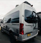 Silver Tranquility 4x4 Sprinter camper van, equipped with a bike rack, ideal for rv rental adventures.