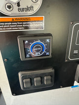 An RV rental control panel: Digital display shows 85°F water temperature, heating status, and warning for bed lift mechanism.