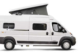 Side view of a white Solis camper van with a raised pop-top roof, ideal for an rv rental experience.