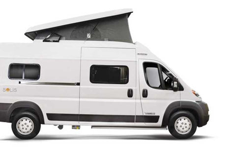 Side view of a white Solis camper van with a raised pop-top roof, ideal for an rv rental experience.