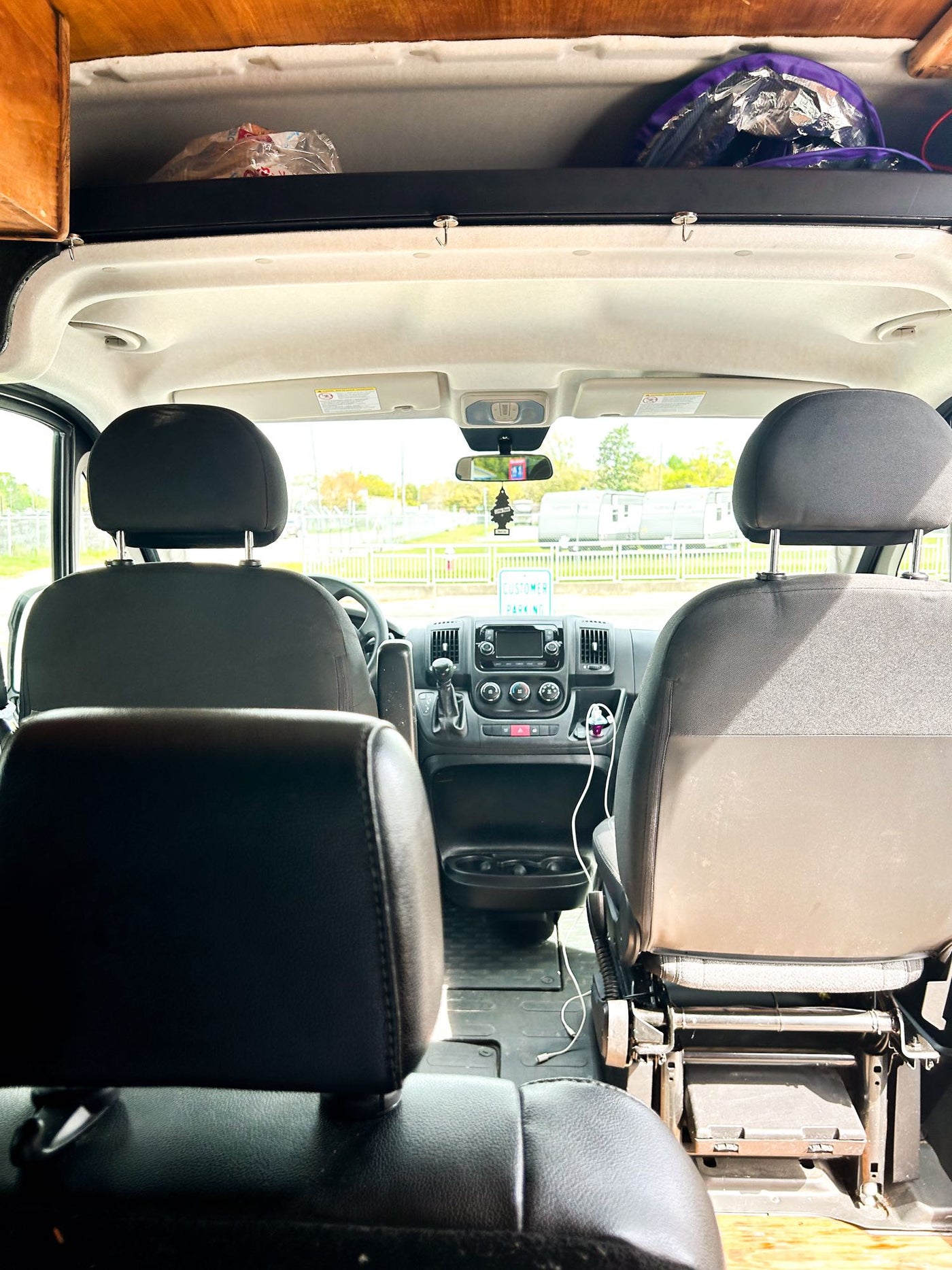  parked on a path by green foliage — photo 3