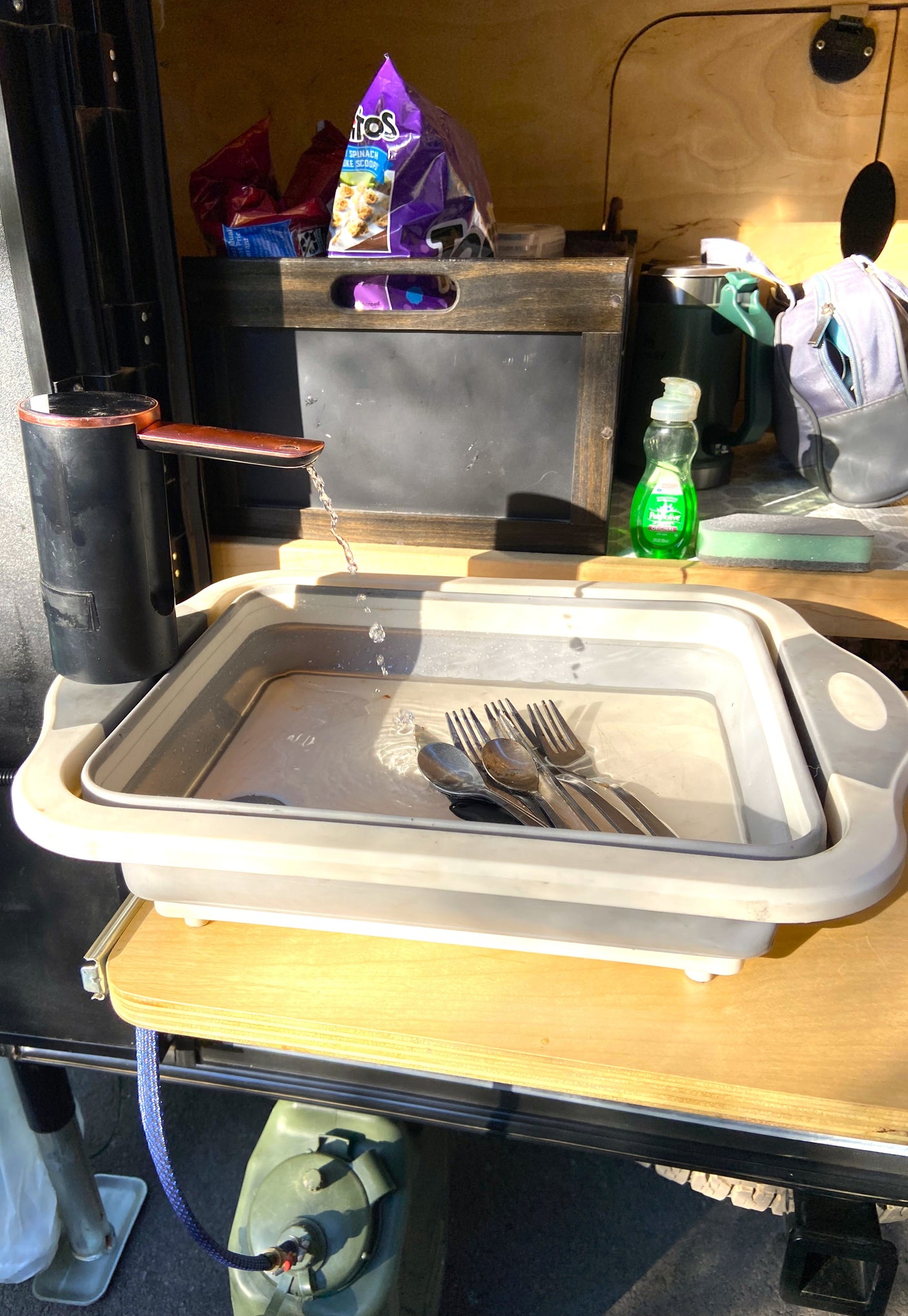 Never worry about dirty dishes on your camping trip. We figured out how to bring every comfort from home, even the kitchen sink :)