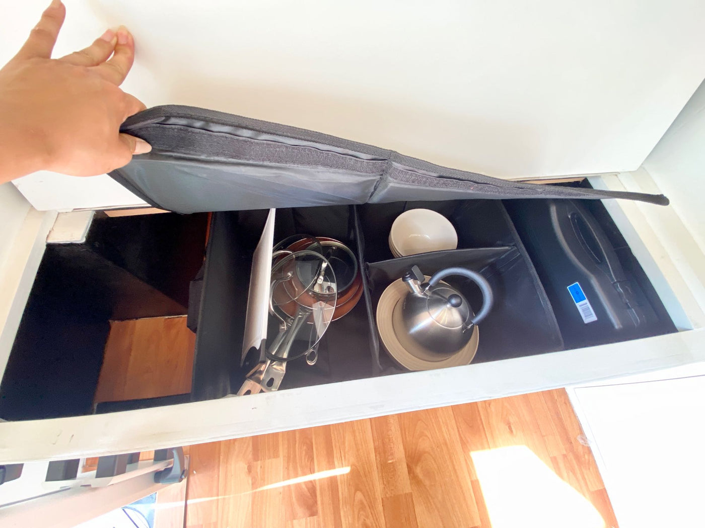  and 'Captain's Quarters' sign.|Cozy RV rental interior with kitchenette — photo 5