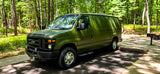 Olive green Ford E-Series van