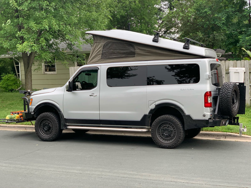  is an ideal RV rental for adventure.|This custom Nissan NV camper van with pop-top tent — photo 3