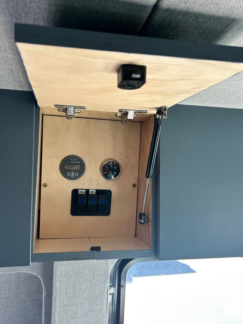  perfect for road trips.|Compact RV rental kitchen with a stainless steel sink — photo 9