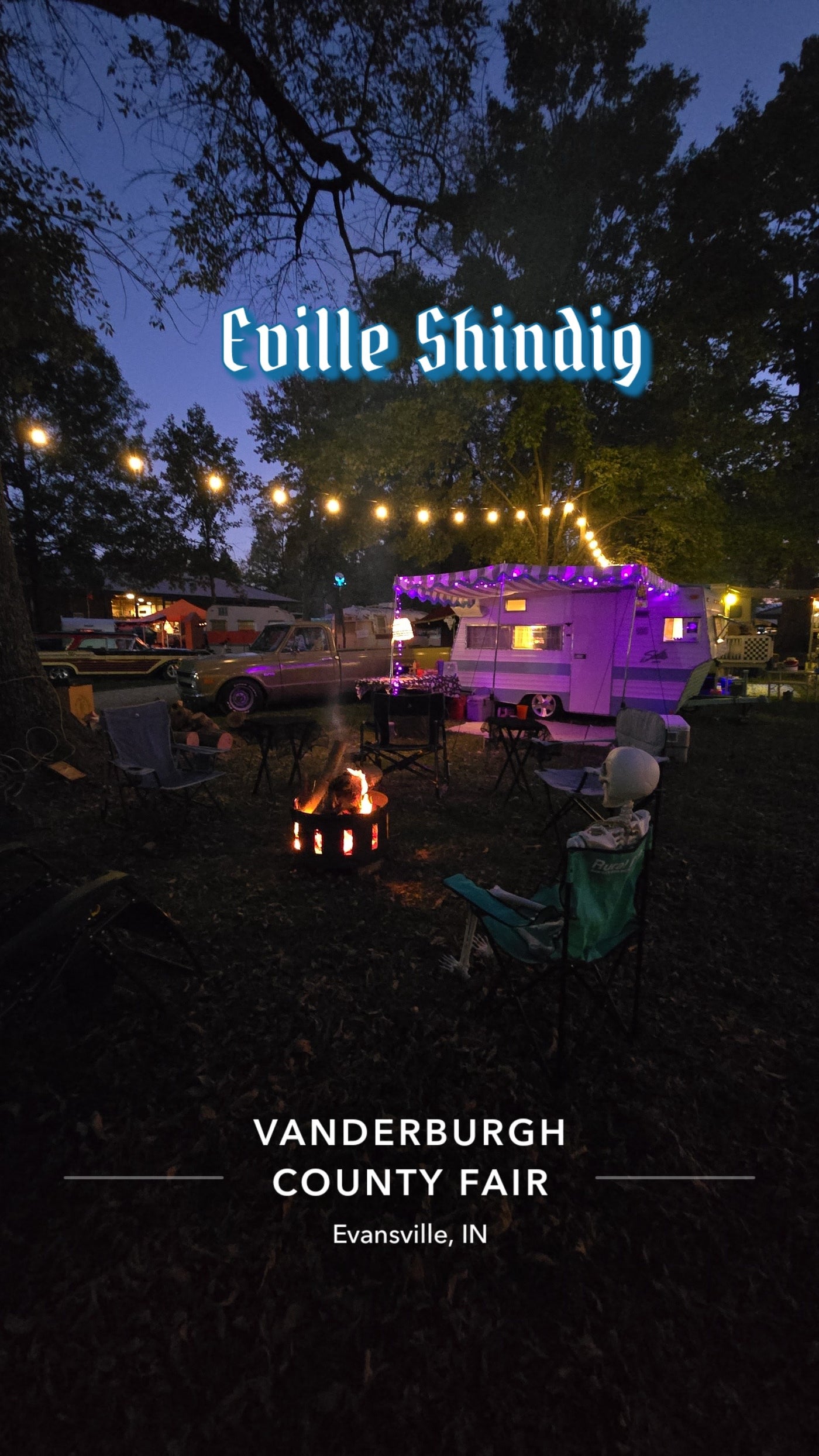 Spooky fun at Eville Shindig at Vanderburgh County Fair! Vintage RV rental, fire pit, and skeleton under string lights. — photo 10