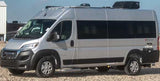 Silver Ethos RV (Ram ProMaster chassis), parked on gravel. Ideal for an rv rental adventure.