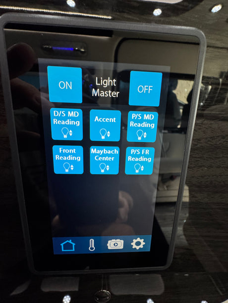 Control panel for lighting in a high-end rv rental, featuring master on/off and individual controls for reading, accent, and center lights.