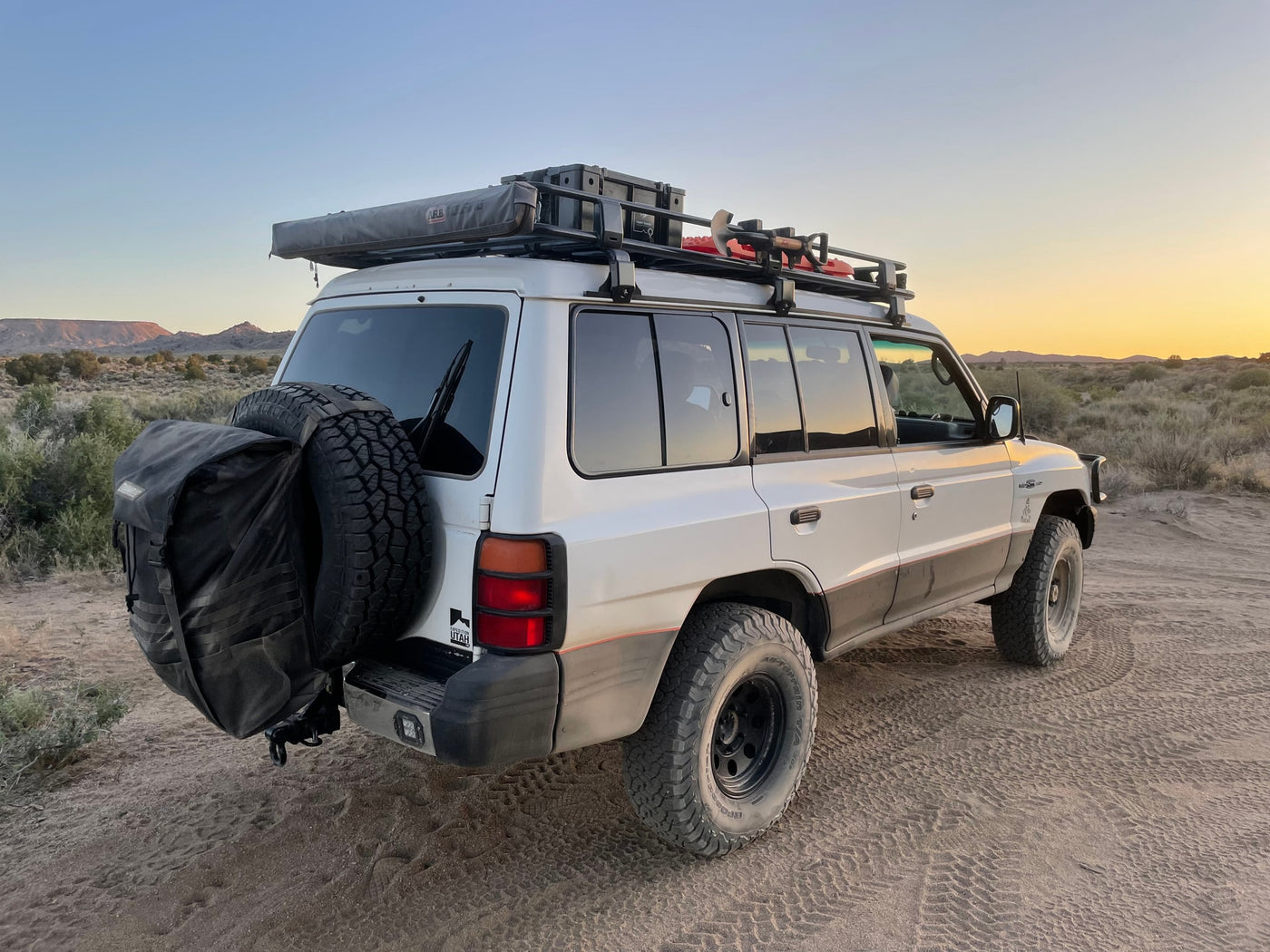 This white overland SUV is ready for desert adventures, offering an alternative to an rv rental for rugged exploration. — photo 16