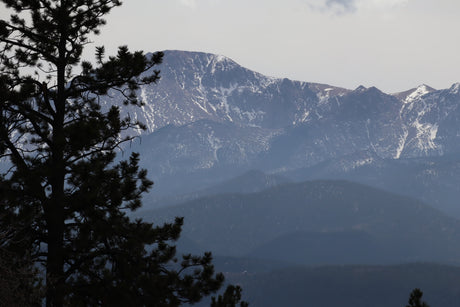 Experience stunning snow-capped mountains & pine forests. An RV rental lets you wake up to views like this!