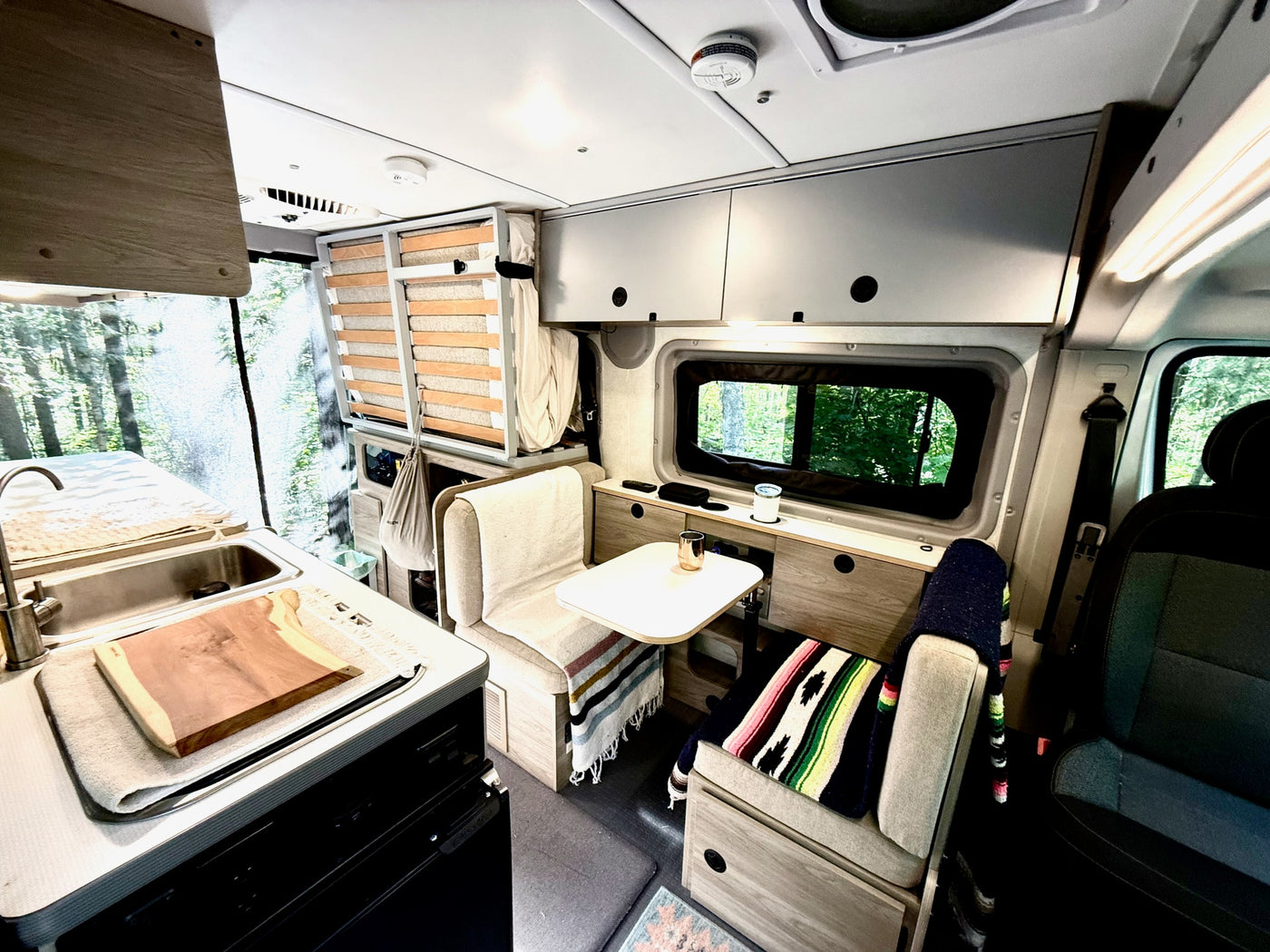  and bicycles.|Modern RV rental interior with full kitchen — photo 4