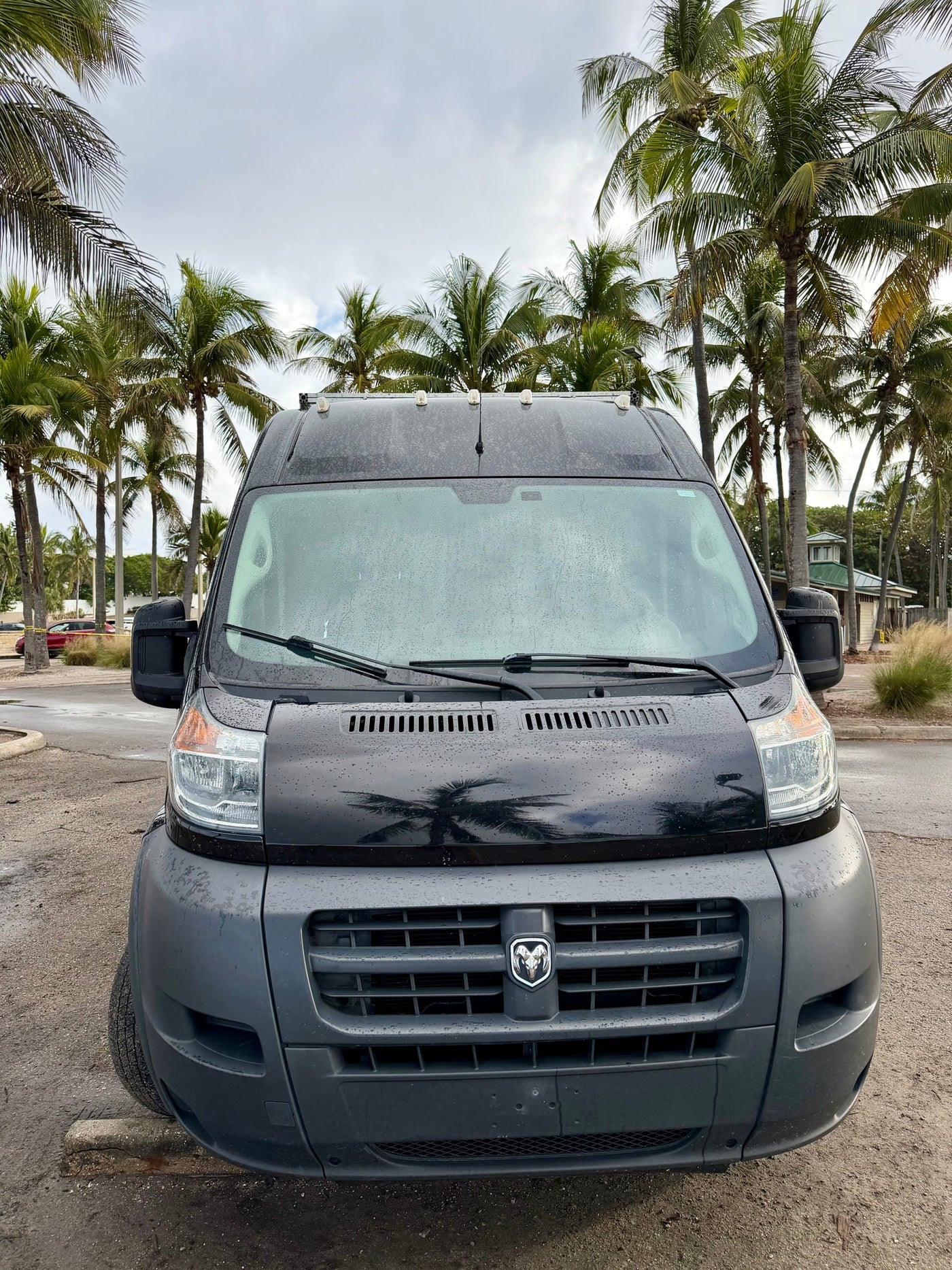  and a scenic waterfront view.|Inside an RV rental: dashboard with backup camera display — photo 18