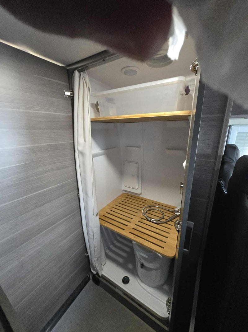  and cloudy sky. Serene coastal landscape.|Solo camper enjoying an **rv rental** trip — photo 10