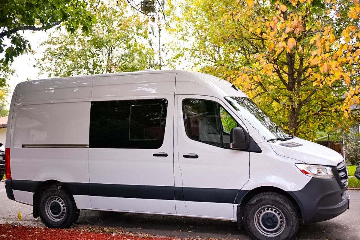 This white high-roof camper van
