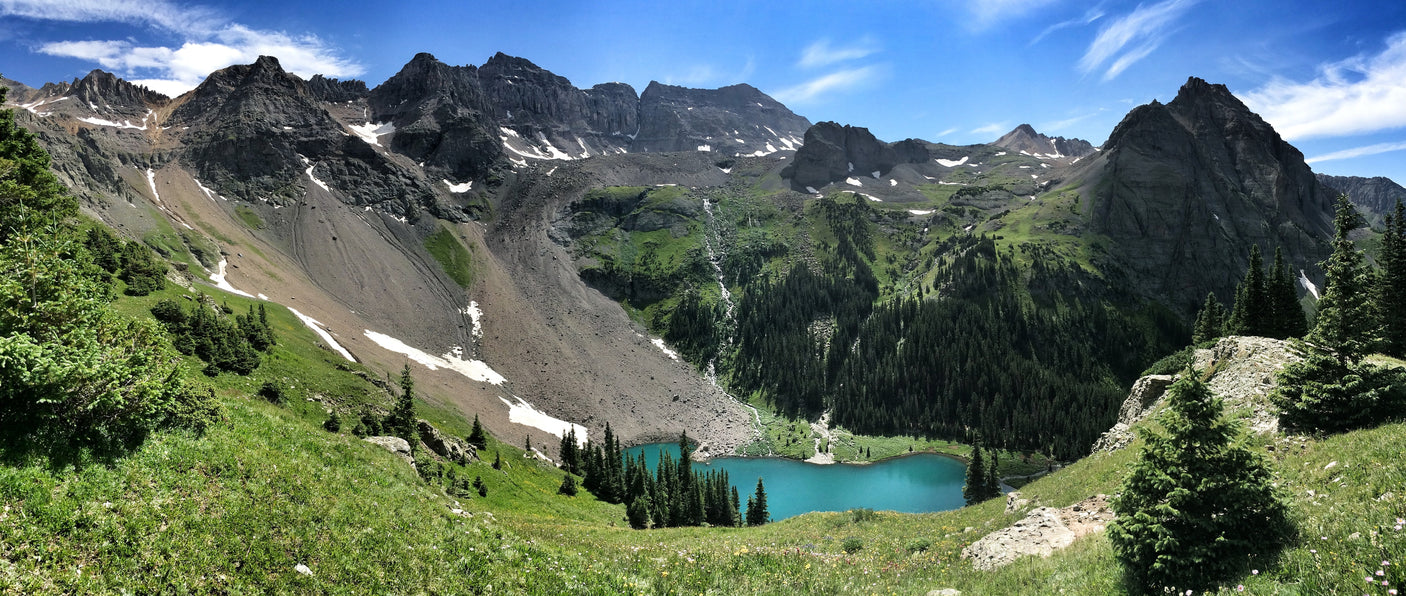 Venture with an RV rental to stunning mountain peaks, vibrant blue alpine lakes, and lush greenery.