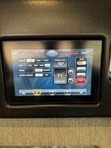 RV rental's Storyteller Overland digital climate control panel shows 72° interior temp, 71° target, with heat active.