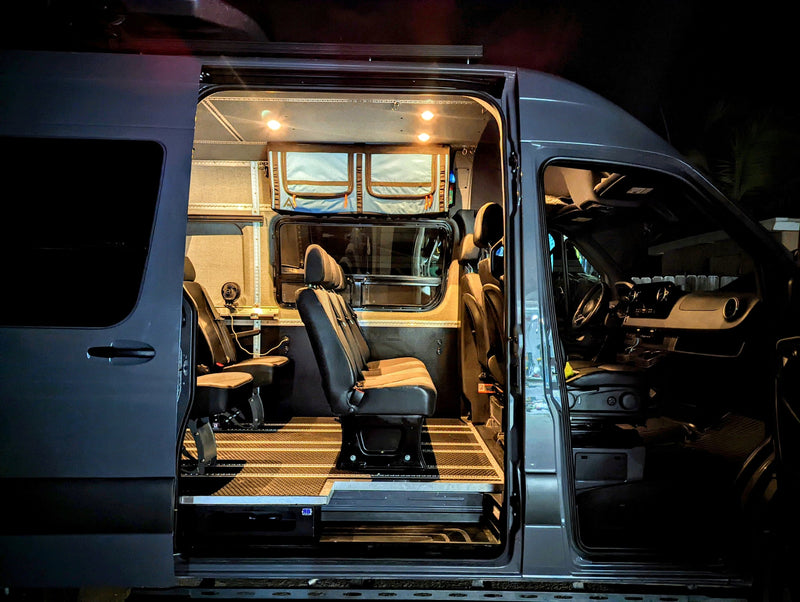  ideal for group adventures.|A dark gray RV rental van — photo 13