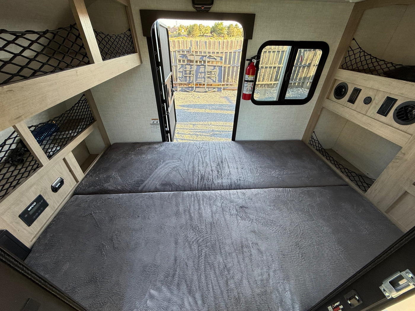  & shadows on cream surface.|Discover this RV rental outdoor kitchen — photo 8