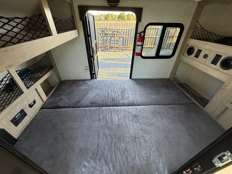 & shadows on cream surface.|Discover this RV rental outdoor kitchen — photo 8