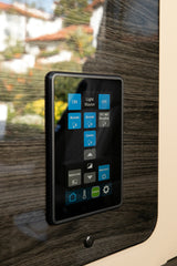 An RV rental smart control panel: This digital touchscreen manages lighting, internet, intercom, and climate for comfort.