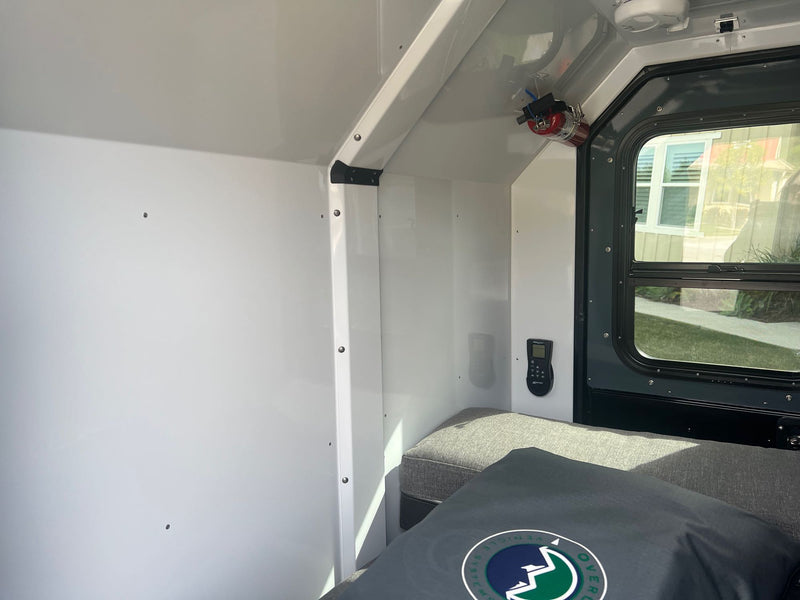  and a convenient pull-out table.|Inside a compact RV rental — photo 6