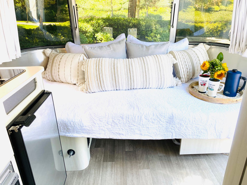  and a vibrant sunflower centerpiece.|Perfect RV rental meal setup: plate — photo 16