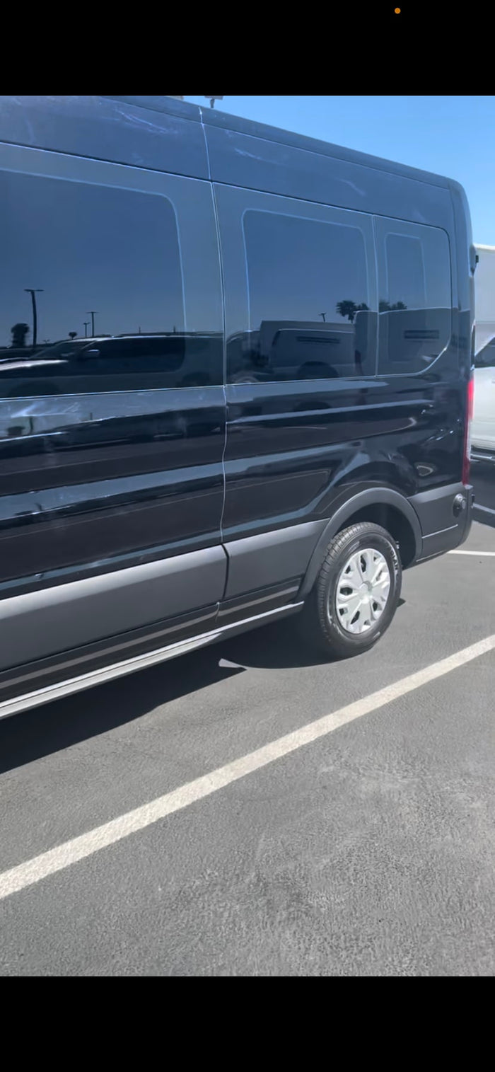  offering comfortable travel.|Experience comfortable group travel! Spacious black leather seating and cup holders inside this luxury RV rental.|Inside a premium RV rental: comfortable black leather captain's chairs with cup holders