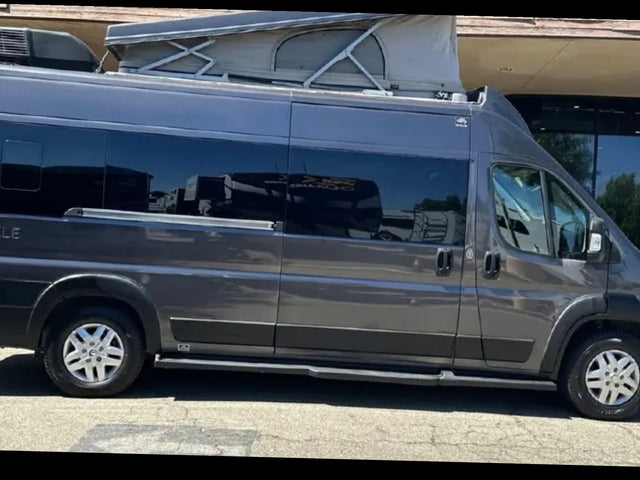 This dark gray pop-top camper van