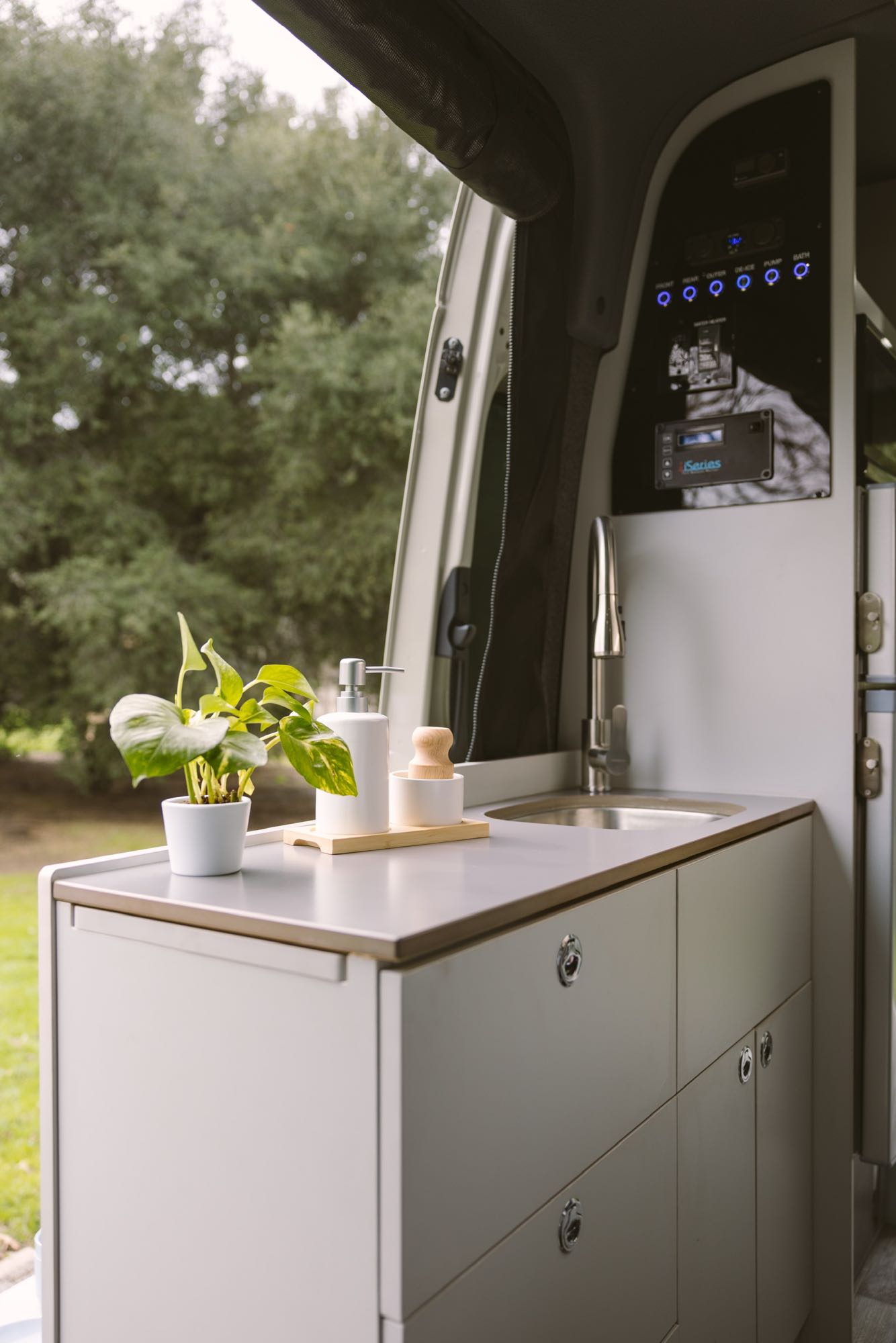  equipped for off-road adventures with a roof rack. Ideal for an RV rental.|Comfortable RV rental camper van interior. Features a cozy bed — photo 4