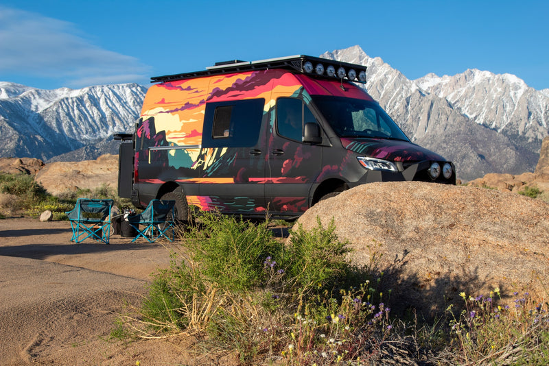  with roof rack & rear gear.|A colorful custom overland van — photo 14