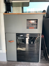 RV rental with a Jackery power station, Bodega cooler, and coffee maker for convenient off-grid living.