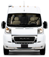 Frontal view of a white Ram ProMaster camper van, ready for an rv rental.