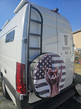 This white custom rv rental van features a rear ladder, solar panels, and a fun patriotic raccoon tire cover.