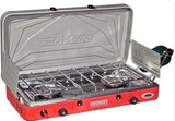 A red Camp Chef Everest 2-burner portable camp stove, perfect for outdoor cooking during an rv rental trip. A gas canister is attached.