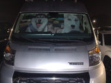 Hilarious dog sunshade featuring two huskies 'driving' a silver Winnebago rv rental van.