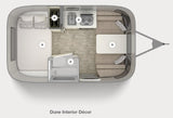 RV rental floor plan: Top-down view of the Dune interior, featuring a bed, kitchen, dining area, and bathroom.