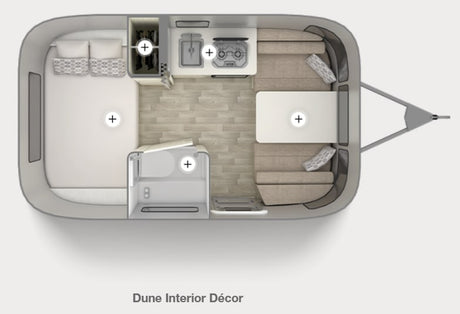 RV rental floor plan: Top-down view of the Dune interior, featuring a bed, kitchen, dining area, and bathroom.